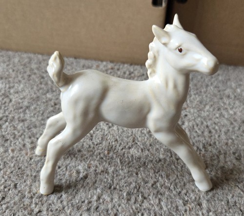 Cream off white ceramic foal - white,